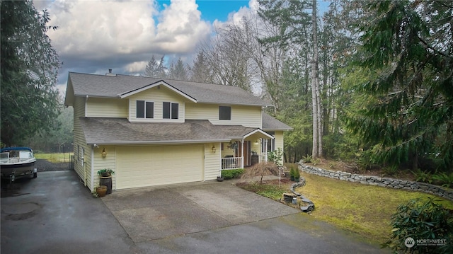 view of front of home with a garage