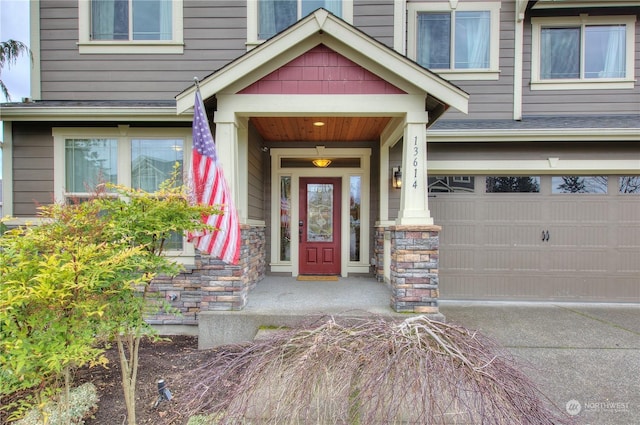 entrance to property featuring a garage