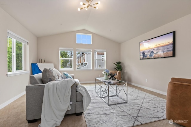 living room with light colored carpet, lofted ceiling, and a notable chandelier