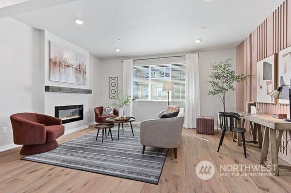 living room with light hardwood / wood-style floors