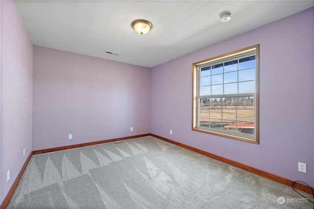 view of carpeted spare room