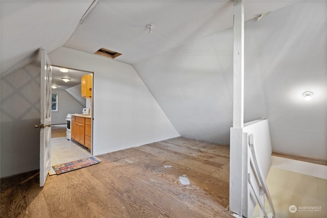 bonus room with vaulted ceiling