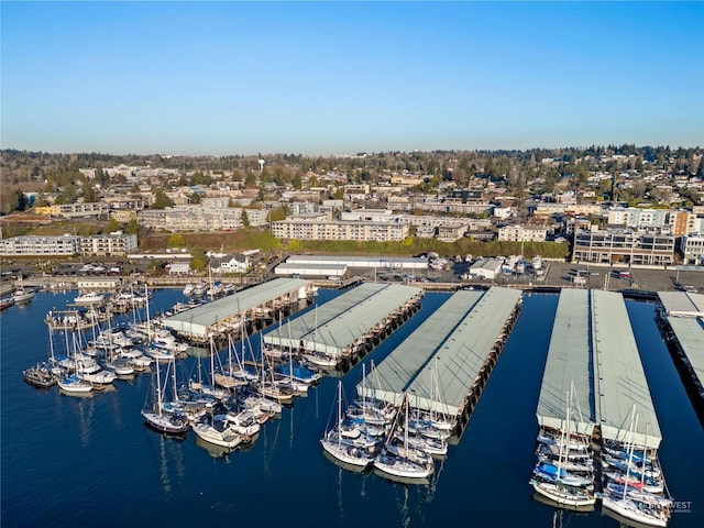 birds eye view of property featuring a water view