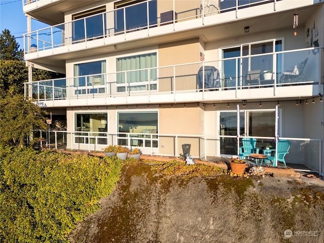 back of house with a patio area