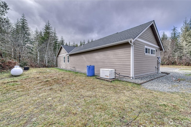 view of property exterior featuring a yard