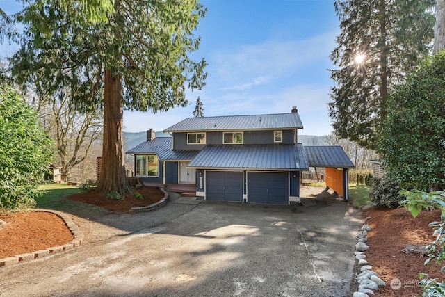 front of property with a garage