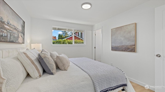 bedroom featuring hardwood / wood-style floors