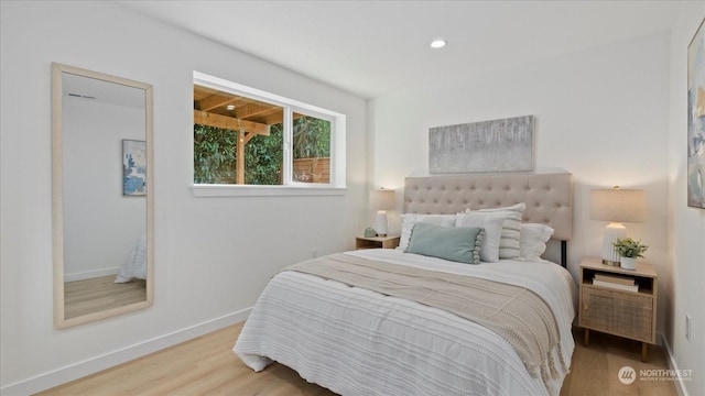 bedroom featuring light hardwood / wood-style flooring