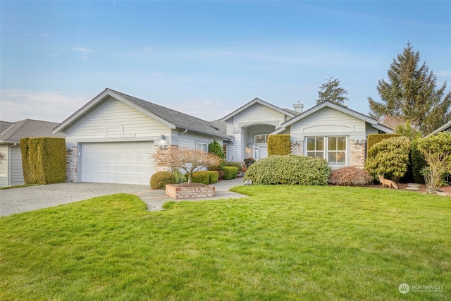 ranch-style house featuring a garage and a front yard