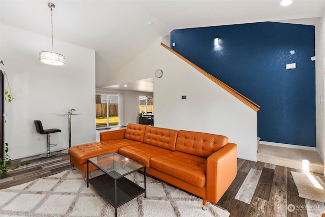 living room with lofted ceiling and wood-type flooring