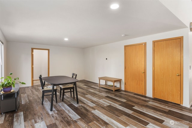 dining area featuring dark hardwood / wood-style floors