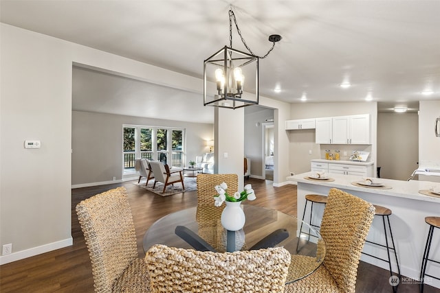 dining room featuring dark hardwood / wood-style flooring