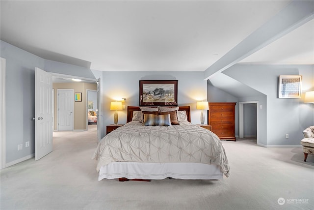 bedroom featuring light colored carpet