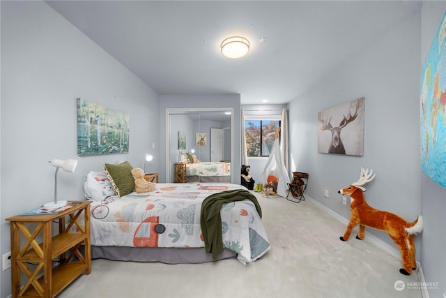 bedroom featuring carpet floors and a closet