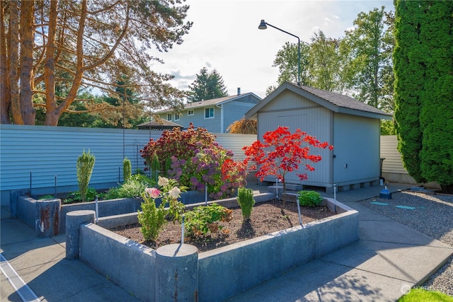 view of front of house featuring a shed