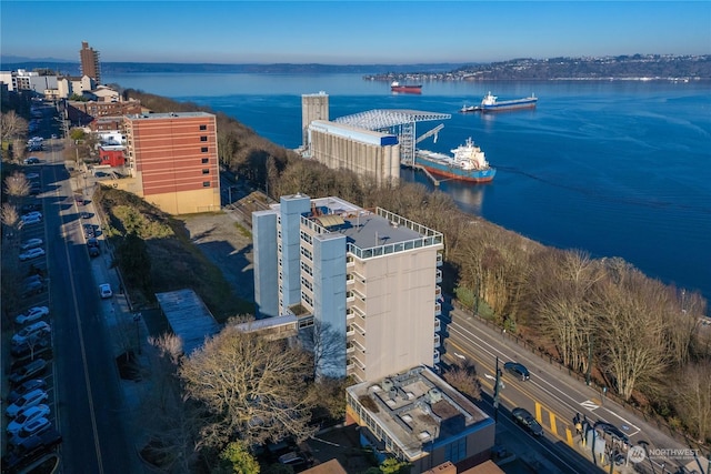 drone / aerial view featuring a water view