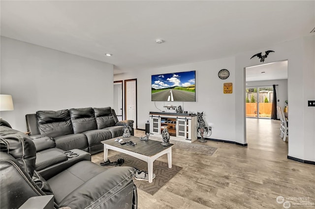 living room featuring light wood-type flooring