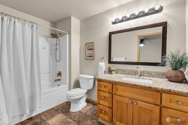 full bathroom featuring shower / bathtub combination with curtain, vanity, and toilet