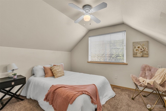 bedroom featuring ceiling fan, vaulted ceiling, and carpet