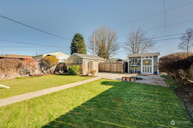 view of yard with a storage unit