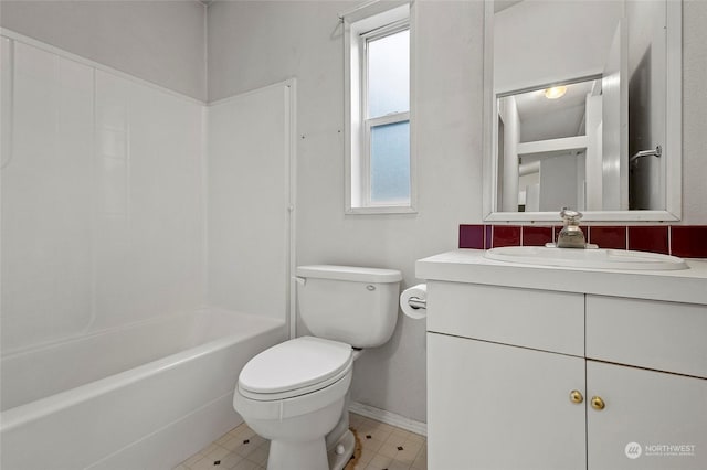 full bathroom featuring vanity, tub / shower combination, and toilet