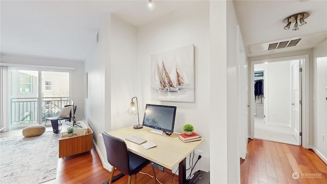 office area featuring hardwood / wood-style floors