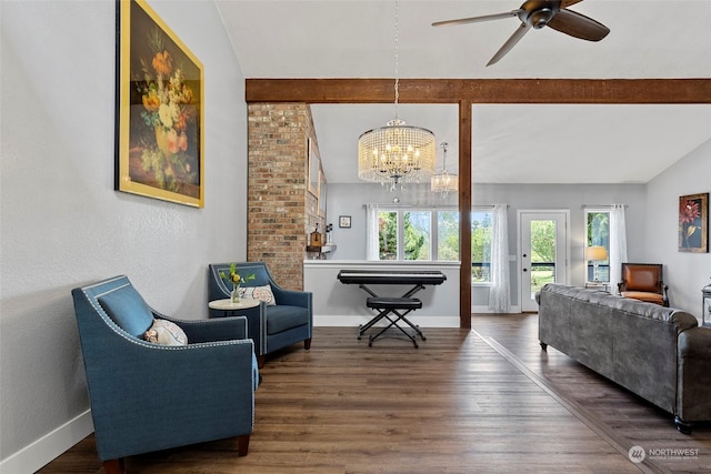 living room featuring ceiling fan with notable chandelier, dark hardwood / wood-style floors, and vaulted ceiling with beams