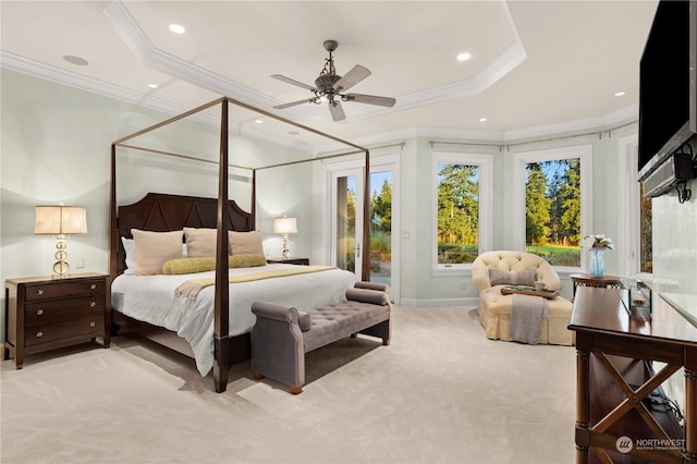 bedroom featuring light carpet, crown molding, access to outside, and a raised ceiling