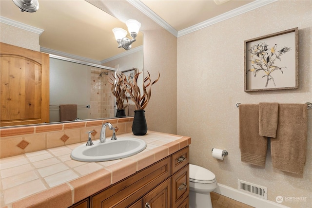 bathroom featuring crown molding, curtained shower, vanity, and toilet