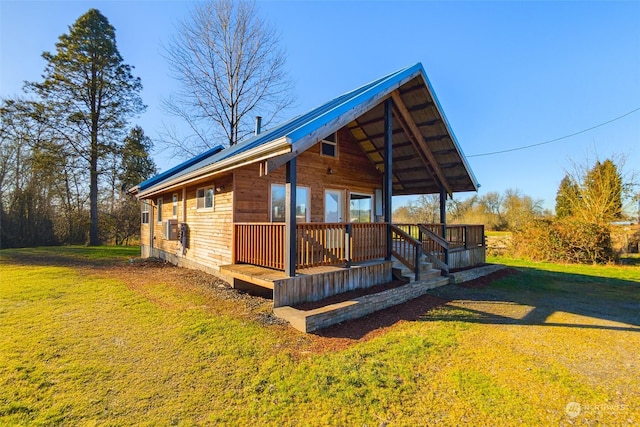 exterior space with a front yard and a deck