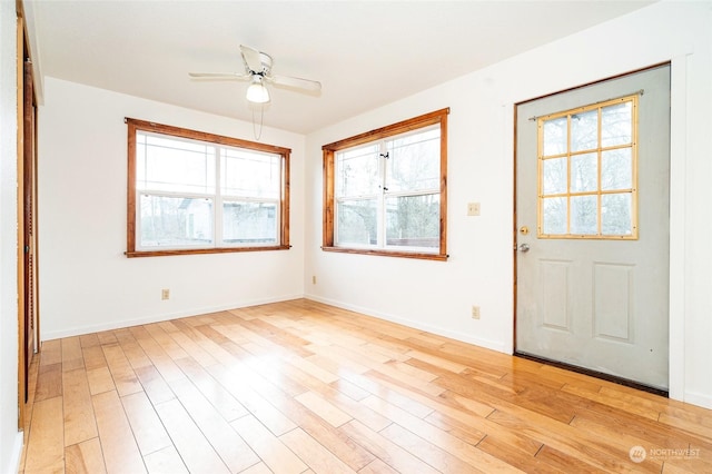 entryway featuring ceiling fan and light wood-type flooring