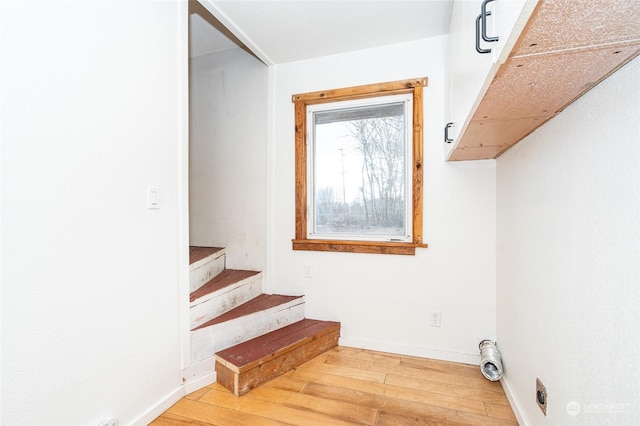 interior space with hardwood / wood-style flooring