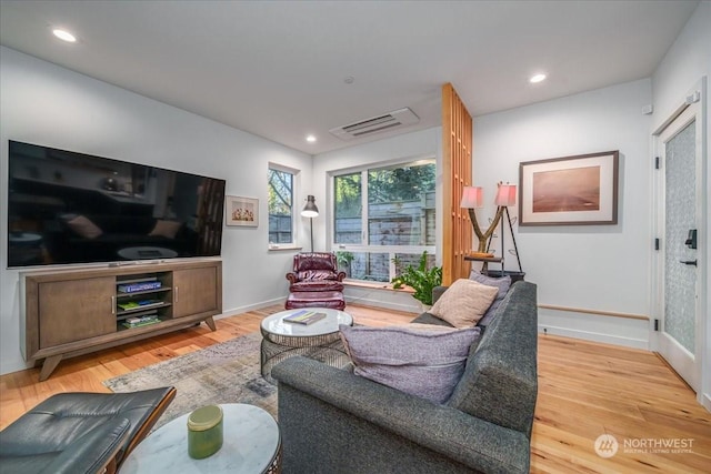 living room featuring light hardwood / wood-style flooring