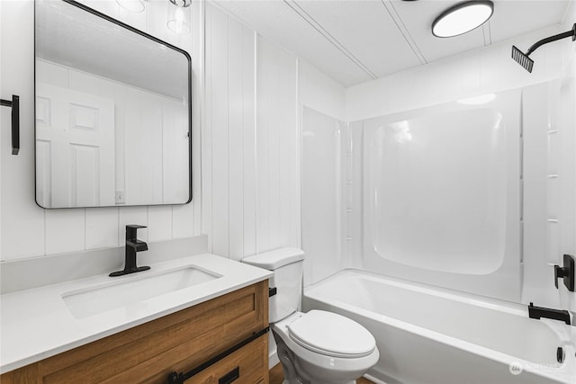 full bathroom with vanity,  shower combination, and toilet