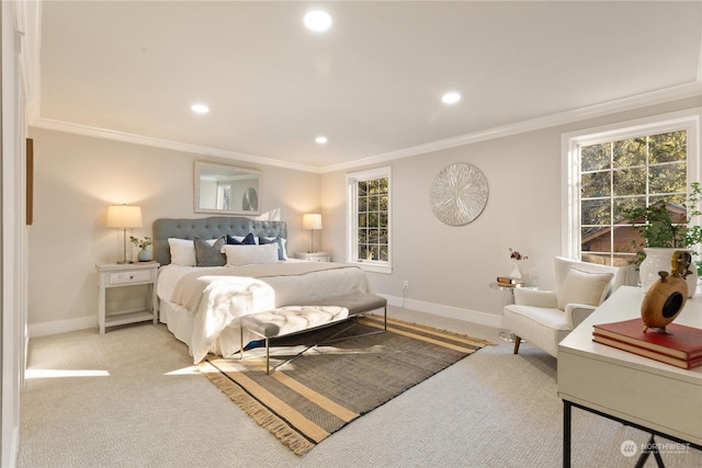 carpeted bedroom featuring crown molding