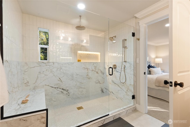 bathroom with crown molding and an enclosed shower