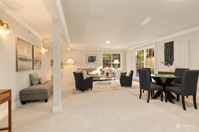 carpeted living room with crown molding