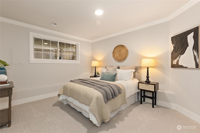 bedroom with ornamental molding and light carpet