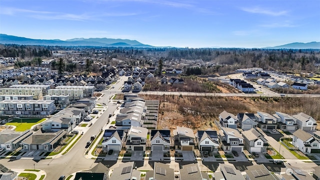 drone / aerial view featuring a mountain view