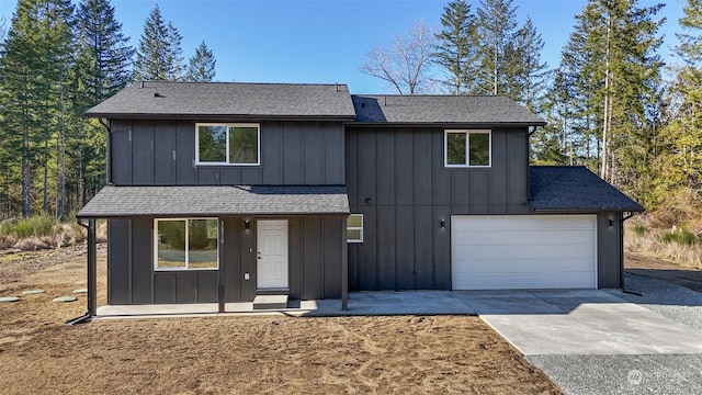 view of front of property featuring a garage