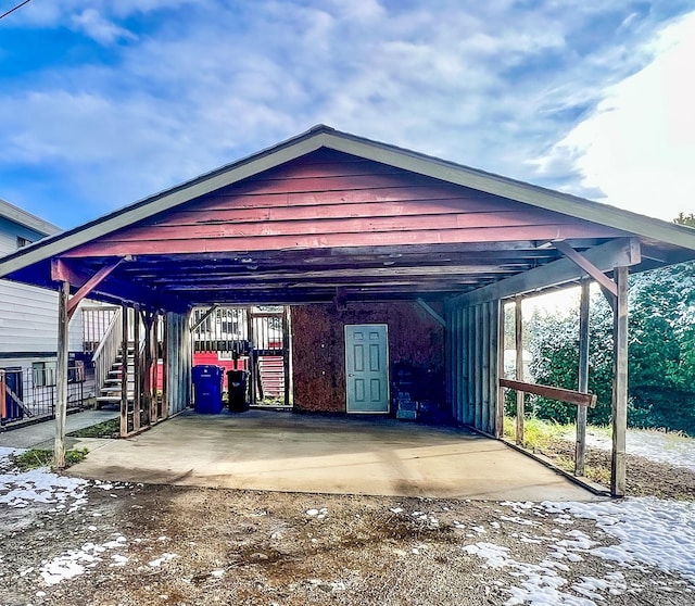 exterior space with a carport