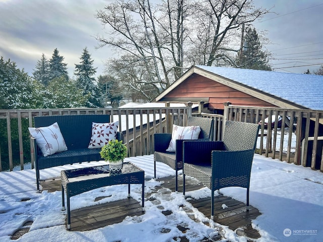 view of snow covered deck