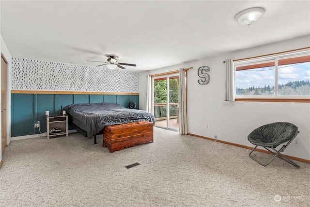 bedroom featuring ceiling fan, carpet flooring, and access to exterior