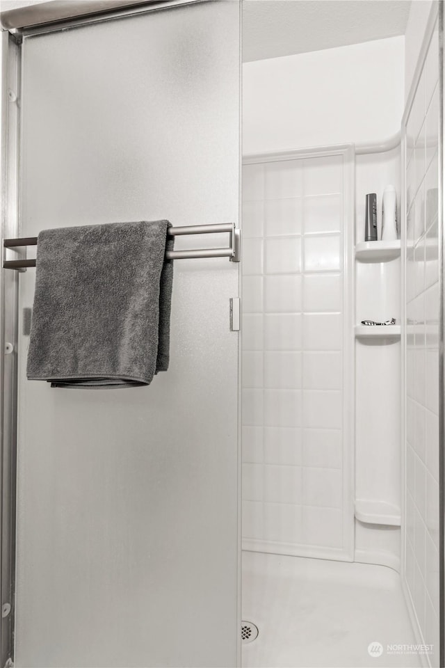 bathroom with an enclosed shower