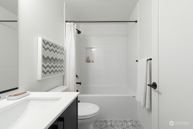 full bathroom featuring vanity, toilet, tile patterned flooring, and shower / tub combo