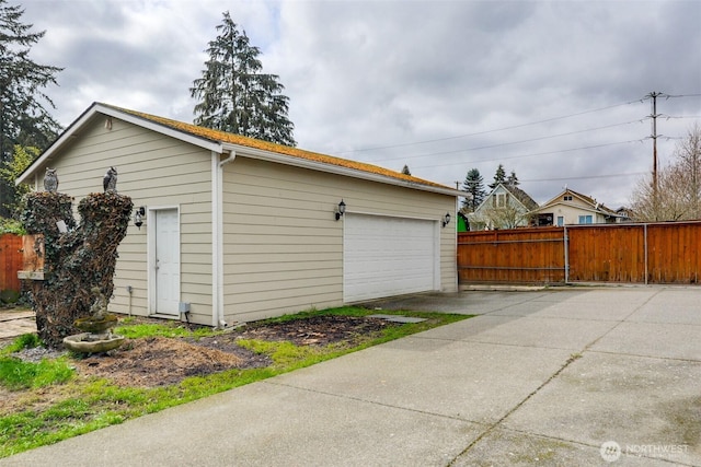 detached garage with fence