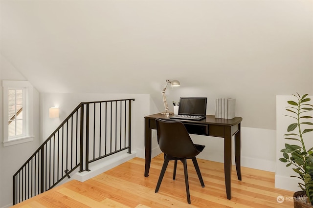 office area with lofted ceiling and hardwood / wood-style flooring