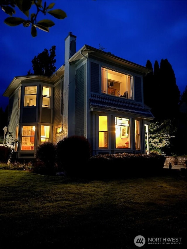 1510 W Water St, South Bend, WA 98586 - back of house at night with a chimney