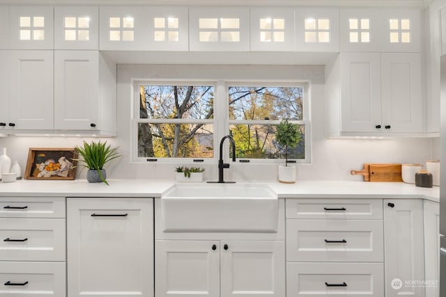 kitchen with sink and white cabinets