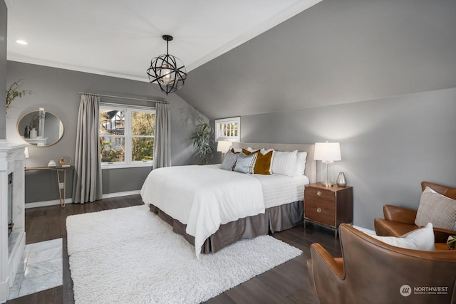 bedroom with dark hardwood / wood-style flooring, crown molding, vaulted ceiling, and a chandelier